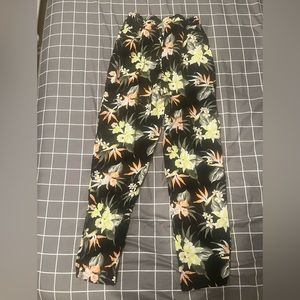 H&M Black w/floral print lose pants. Size 6.